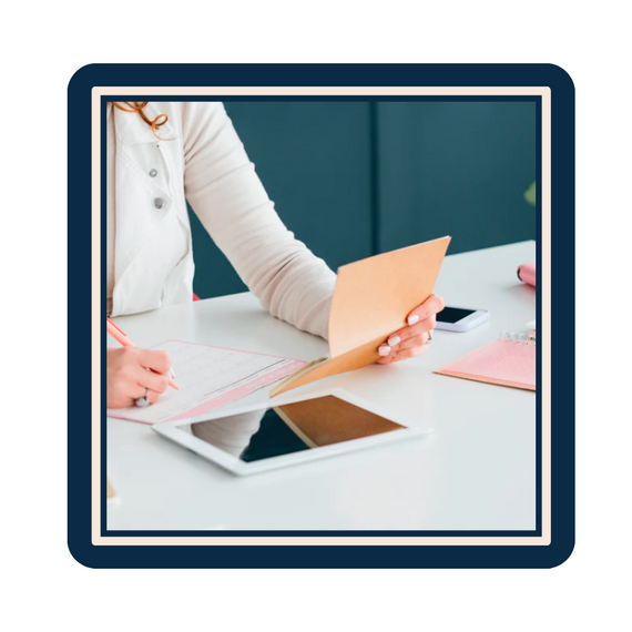 Woman working at a desk in a professional setting